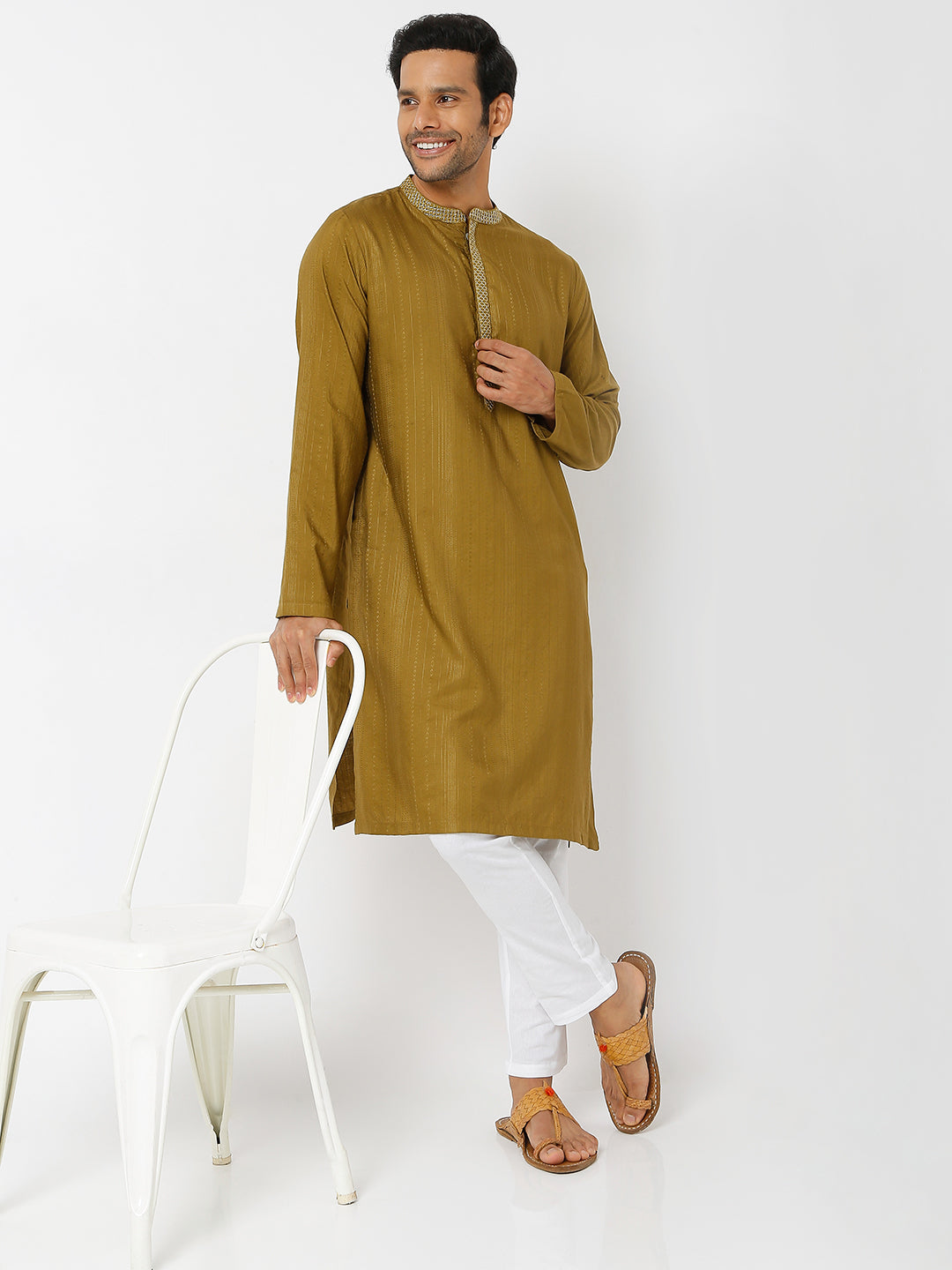 Men's mustard embroidered cotton knee-length kurta, collar and neckline detail.