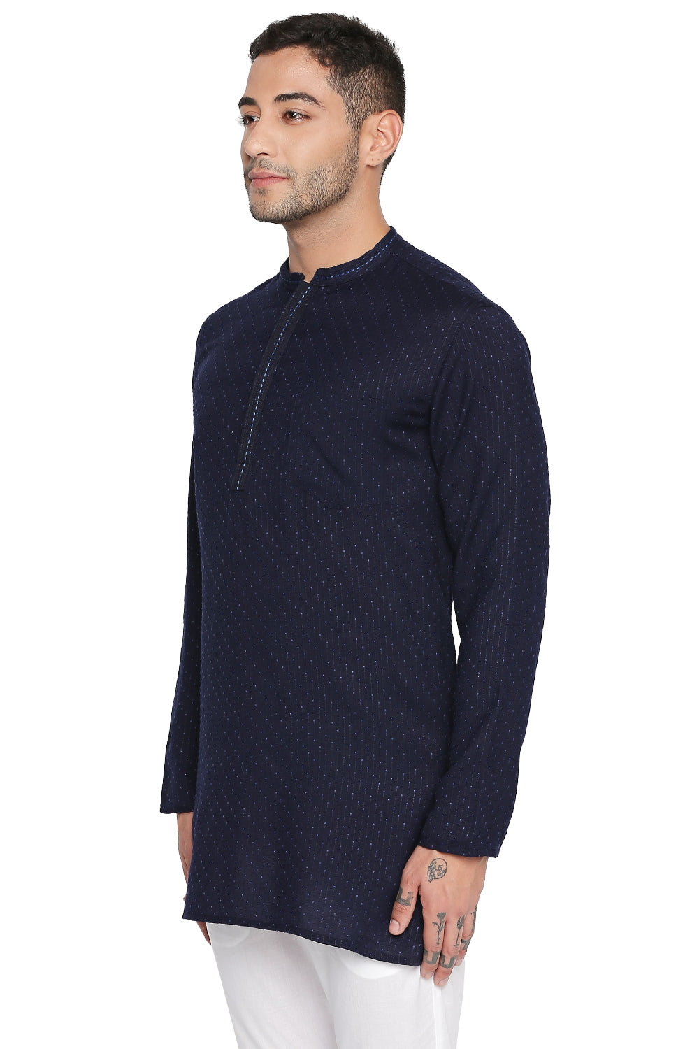 Men's navy hand-embroidered cotton blend knee-length kurta, side view.