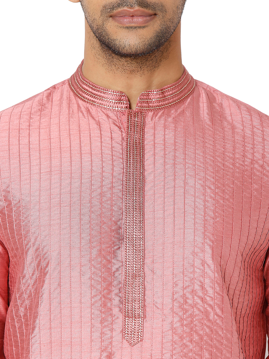 Men's pink embroidered cotton knee-length kurta, close-up detail.