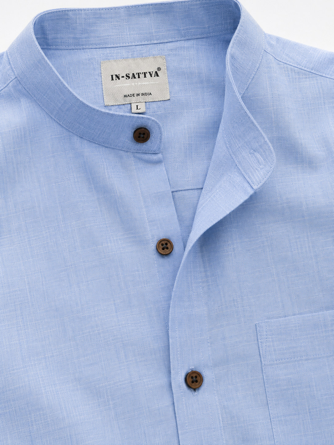 Lifestyle view of In-Sattva men's sky blue cotton hip-length button-down shirt