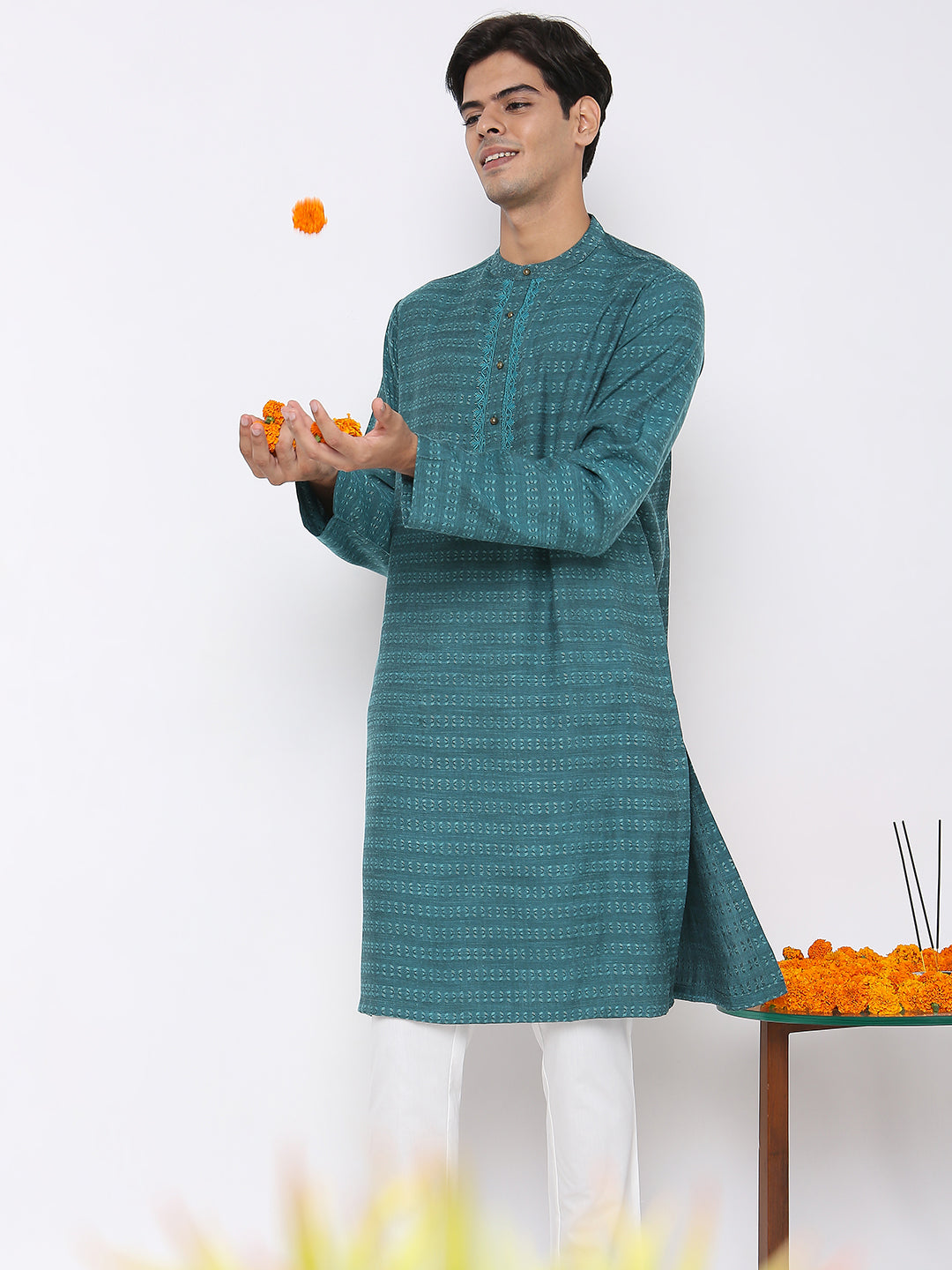 Men's turquoise embroidered cotton knee-length kurta, collar and neckline detail.