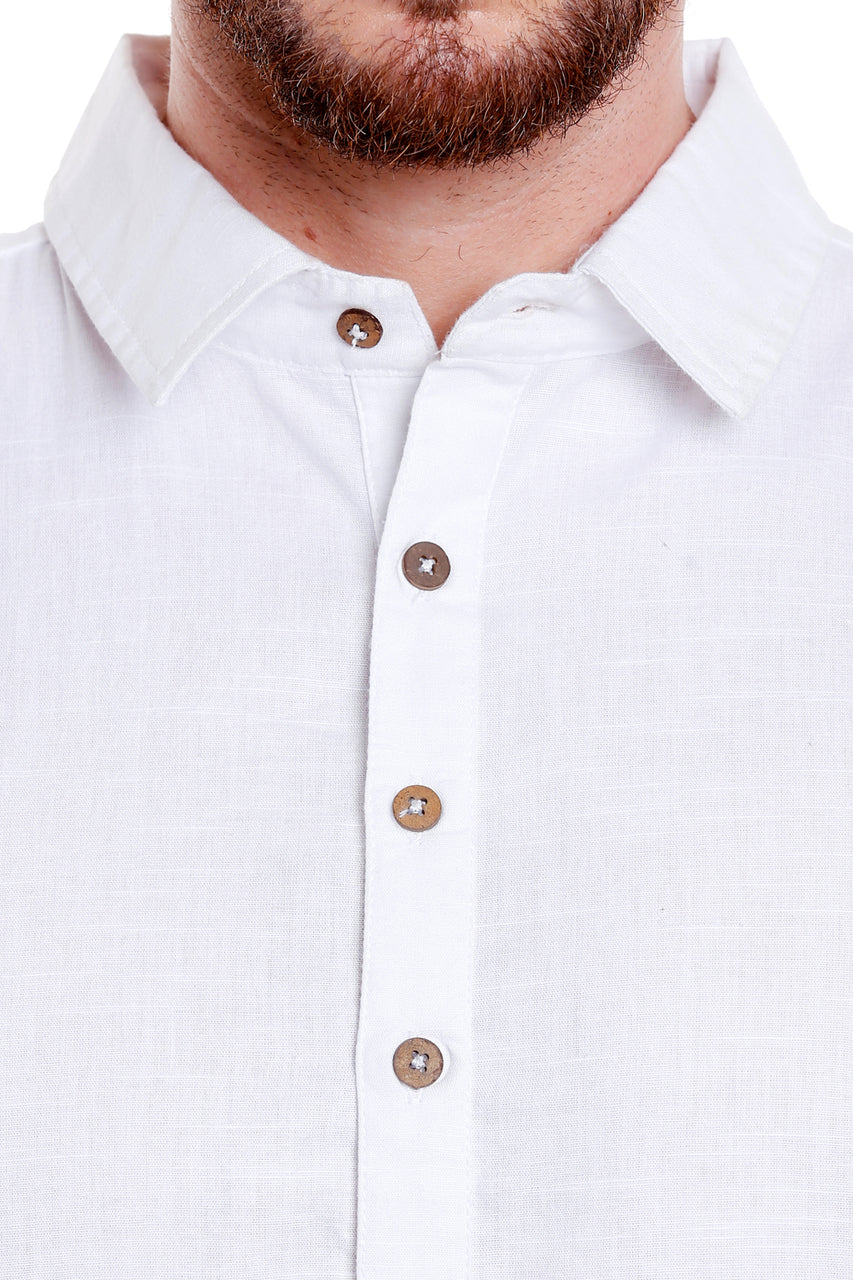 Detail of men's white cotton Pathani roll-up sleeve kurta tunic with shoulder strap, suitable for wedding guest looks.