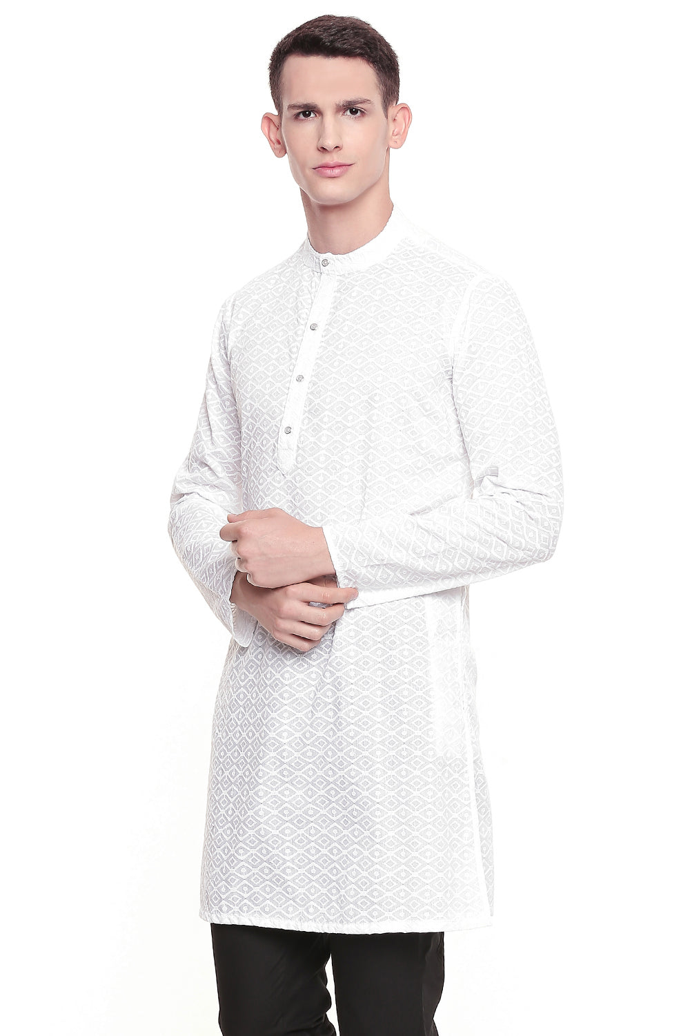 Men's white embroidered cotton knee-length kurta, side view.