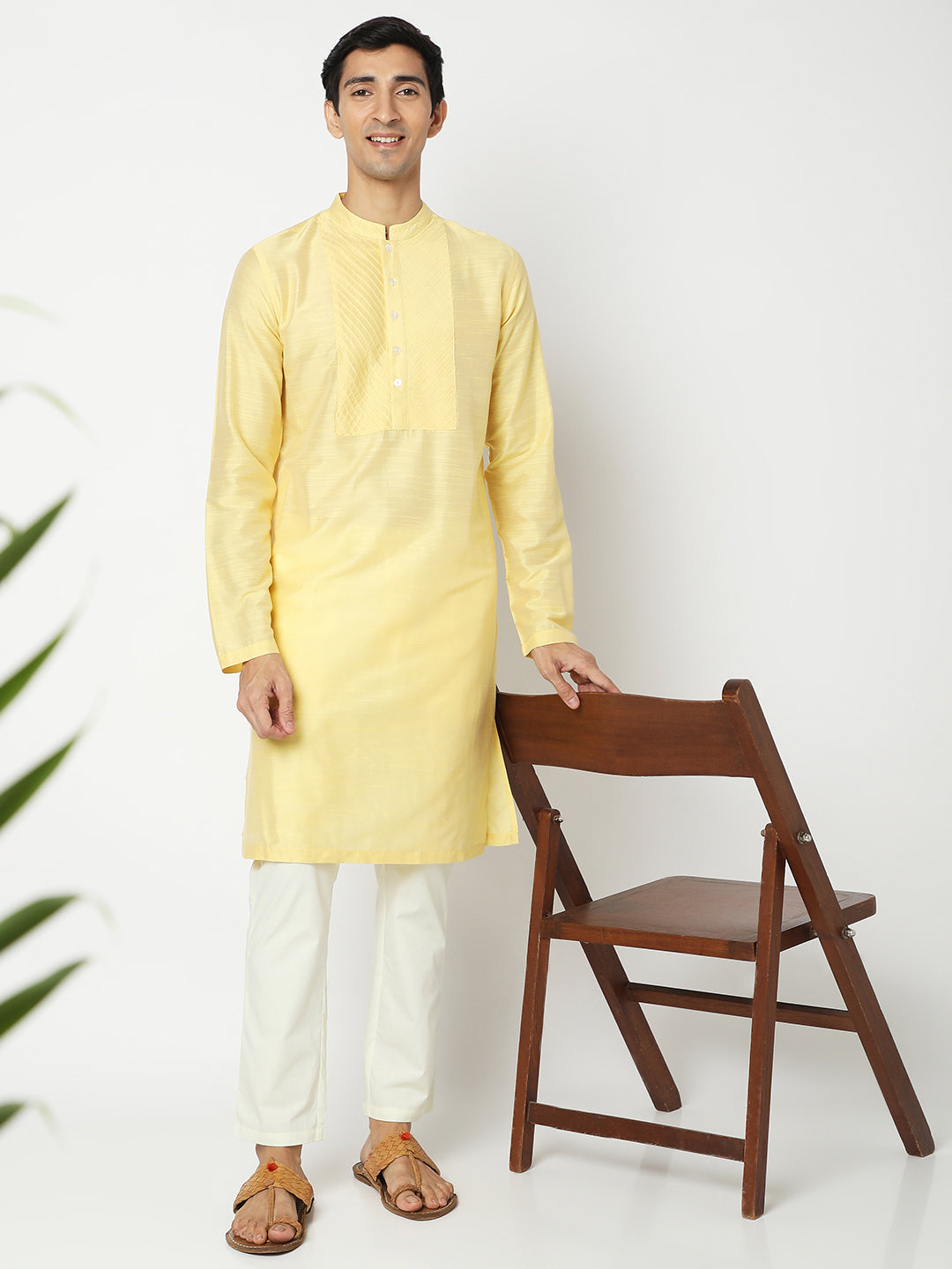 Men's yellow embroidered cotton knee-length kurta style 2, fabric texture detail.
