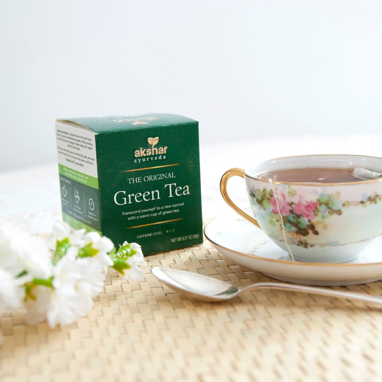Akshar Ayurveda Original Herbal Tea, 10 tea bags brewed tea product lifestyle image