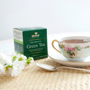 Akshar Ayurveda Original Herbal Tea, 10 tea bags brewed tea product lifestyle image