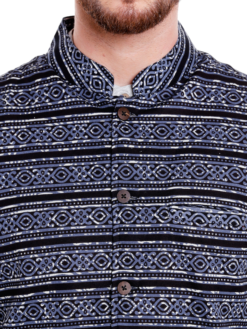 Artistic Indian-print close-up of men's black artistic-print Nehru vest, highlighting ethically made wedding guest style.