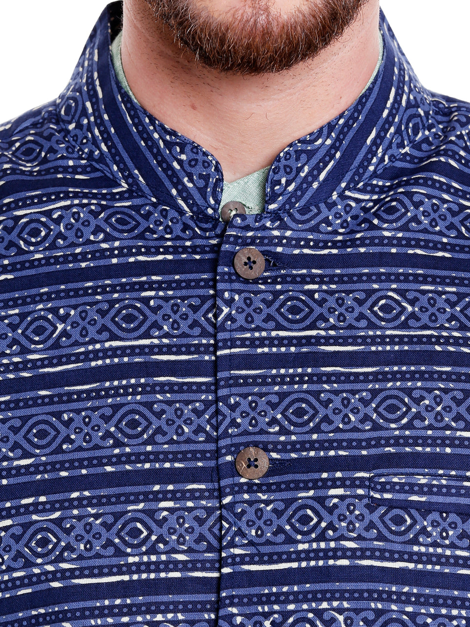Artistic Indian-print close-up of men's blue artistic-print Nehru vest, highlighting slim-fit festive style.
