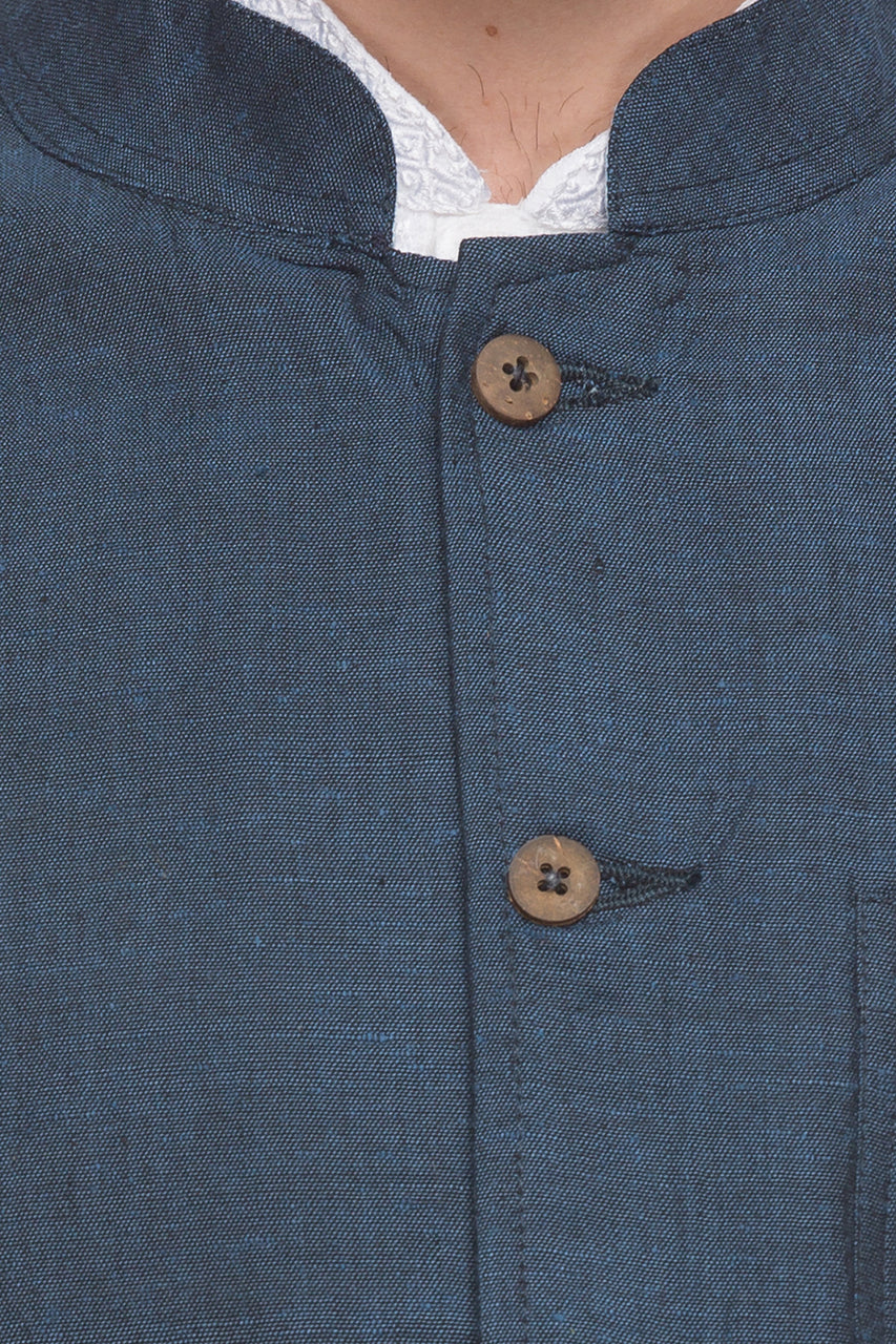 Collar and button close-up of men's blue Mandarin collar button-down vest, highlighting classic premium wedding guest style.