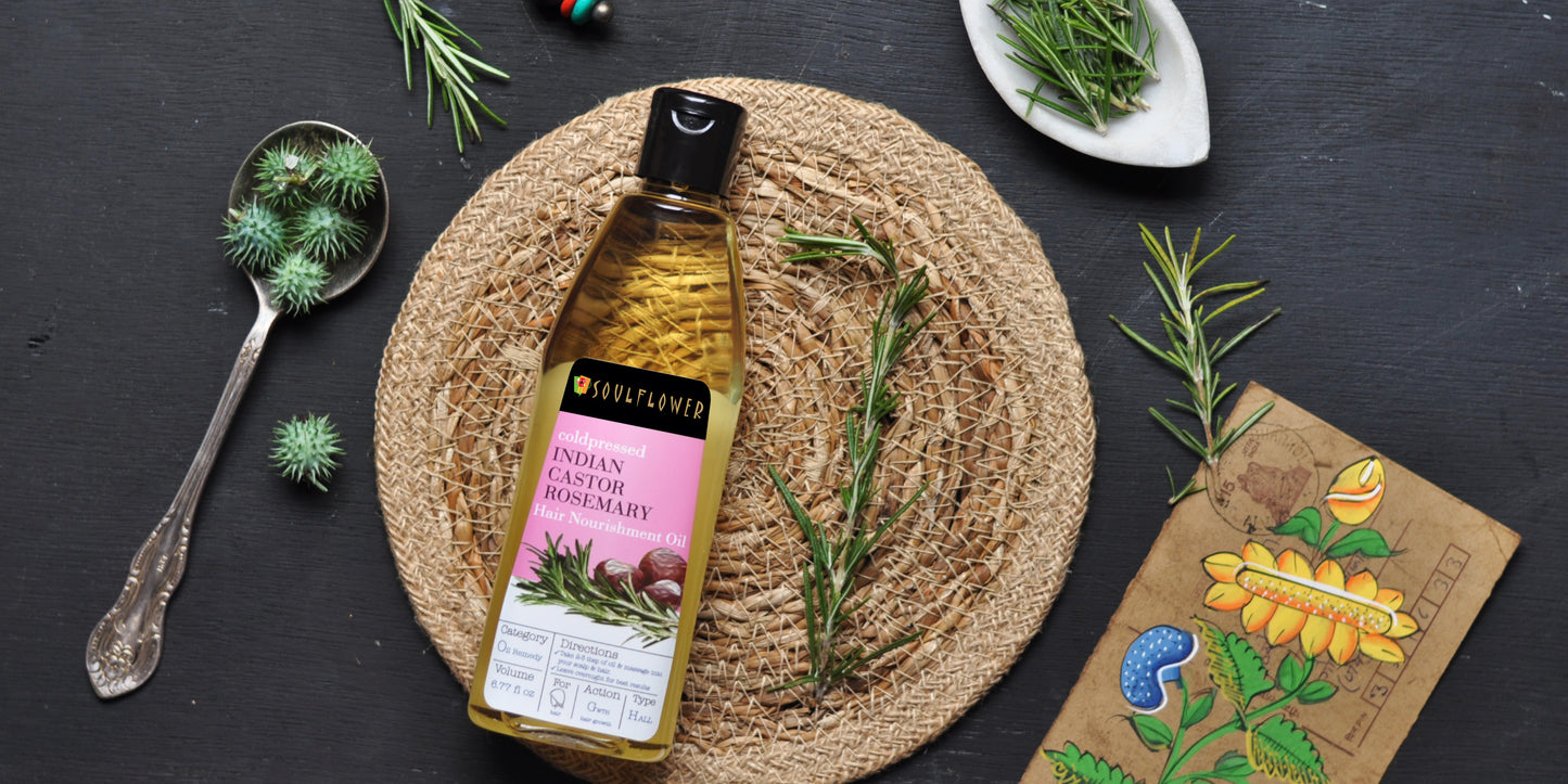 Soulflower Castor and Rosemary Hair Growth Oil bottle, packaging and key botanical ingredients