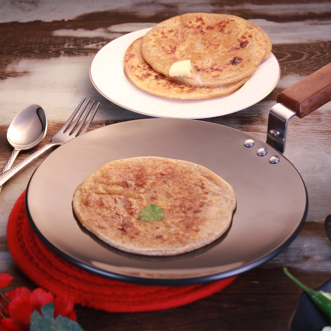 Wonderchef Ebony Anodized Roti Naan Bread Tawa Griddle Pan Pure Grade Aluminum PFOA-Free, Black, 25cm, 28cm, shown with food